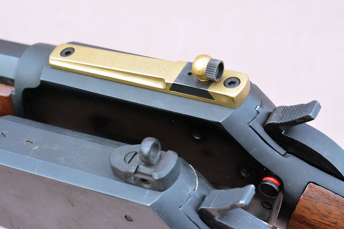 A brass punch is suggested to remove and reinstall dovetail-mounted sights.